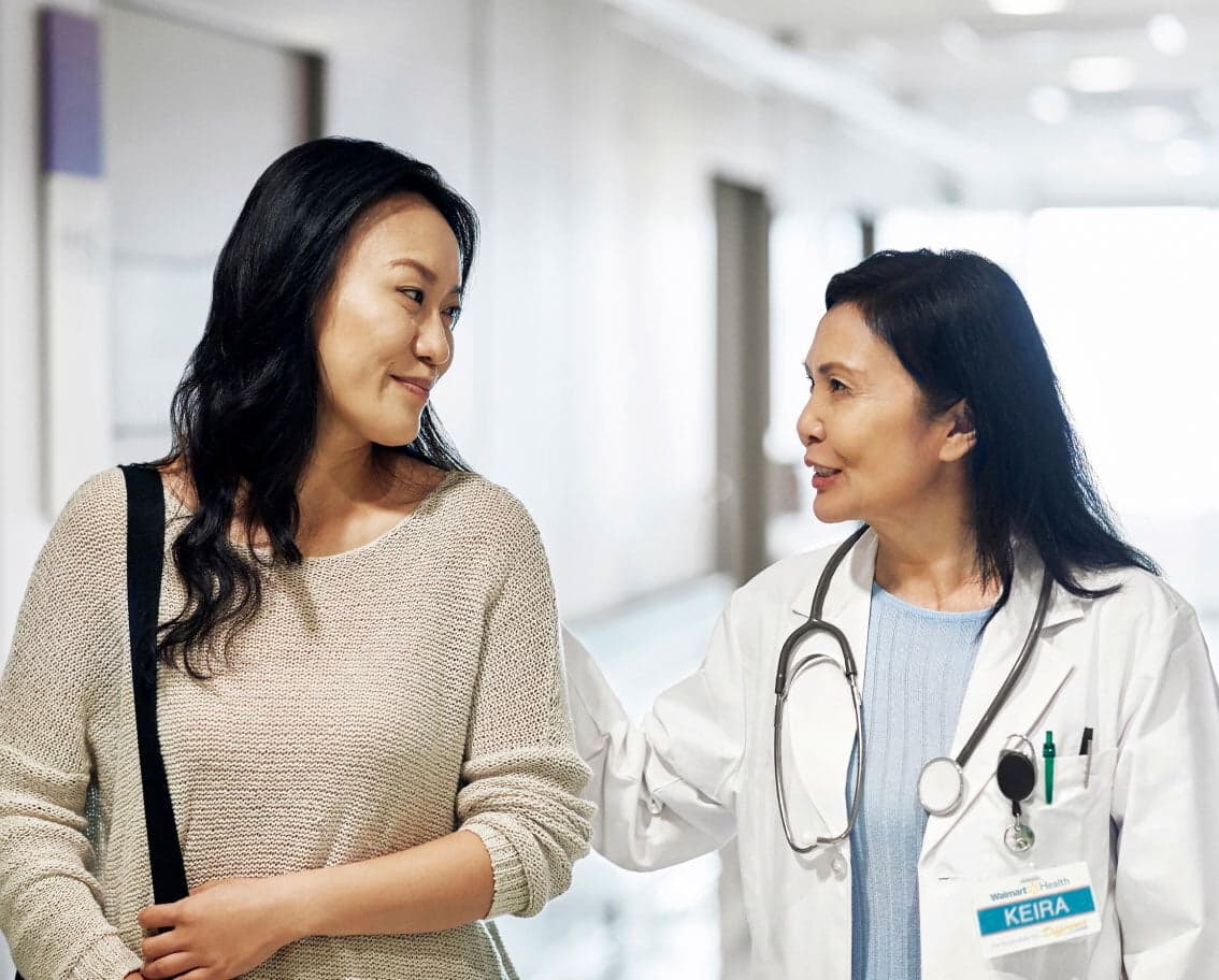 Image of a female doctor chatting with a female patient